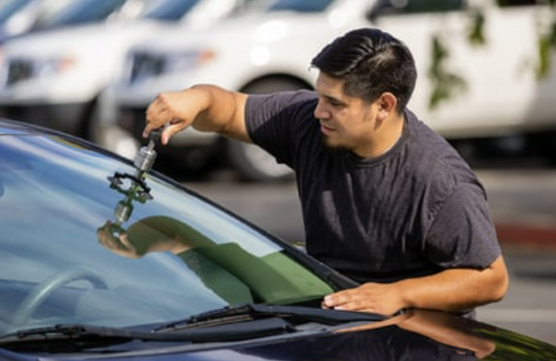 Technician Repairing Rock Chips